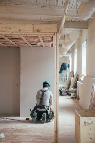 Dealing with Hearing Loss in the Workplace Construction worker inside a building.