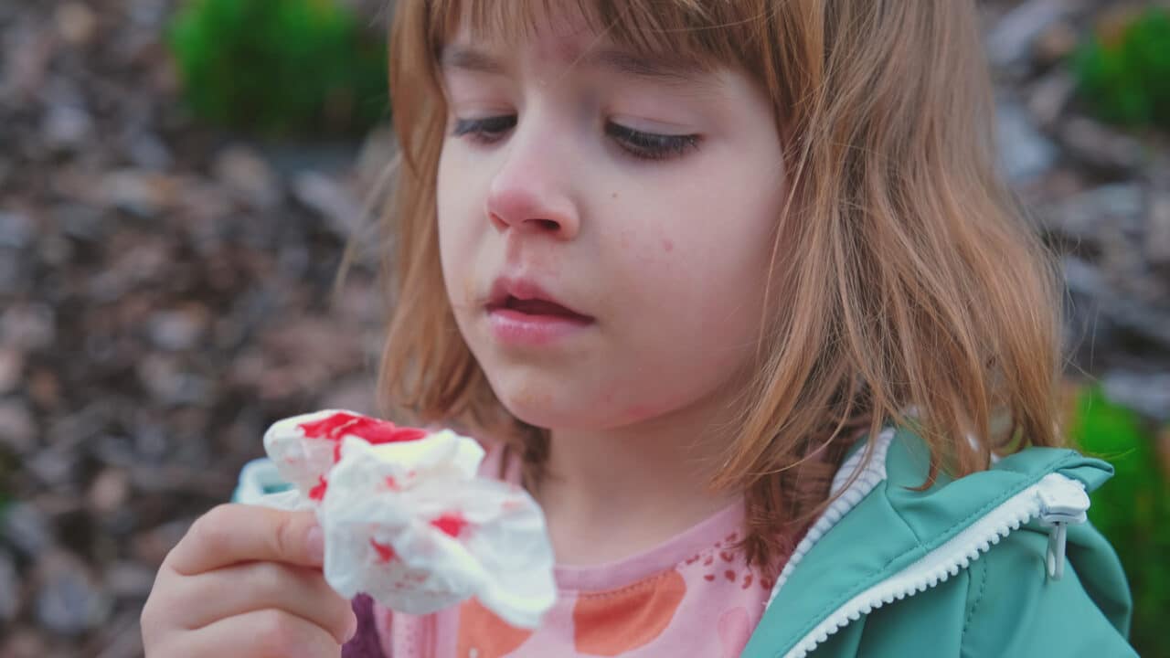 Small girl with nose injury